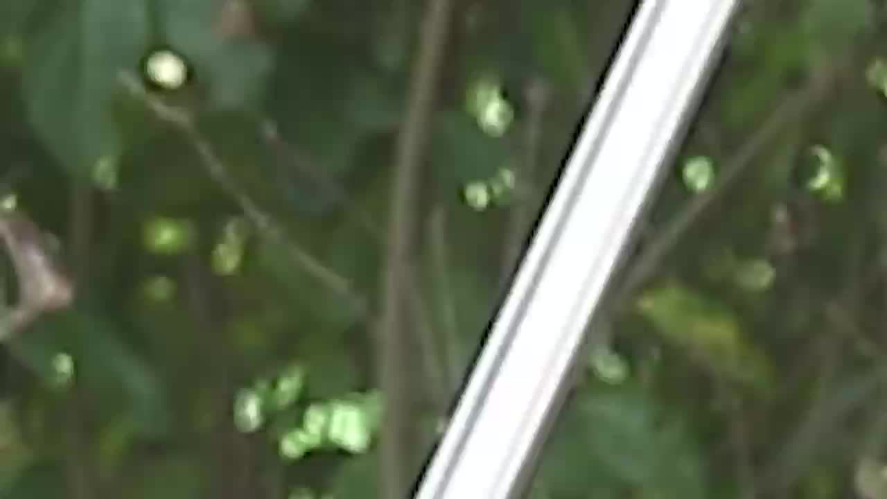 Cordless handheld electric grass trimmer with battery power and auxiliary wheels, multifunctional 3-in-1 grass trimmer pruning tool, used for garden weeding