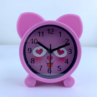 A pink cartoon animal-shaped alarm clock that simulates, silent without ticking, a plastic clock powered by batteries, can be set to remind, suitable for rooms, bedside tables, desks, ideal gift (without batteries)